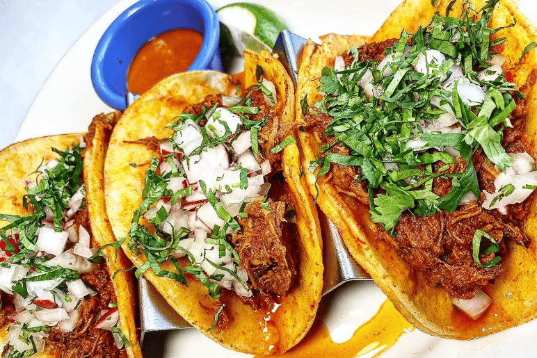 Loaded burrito supreme filled with seasoned meats and beans