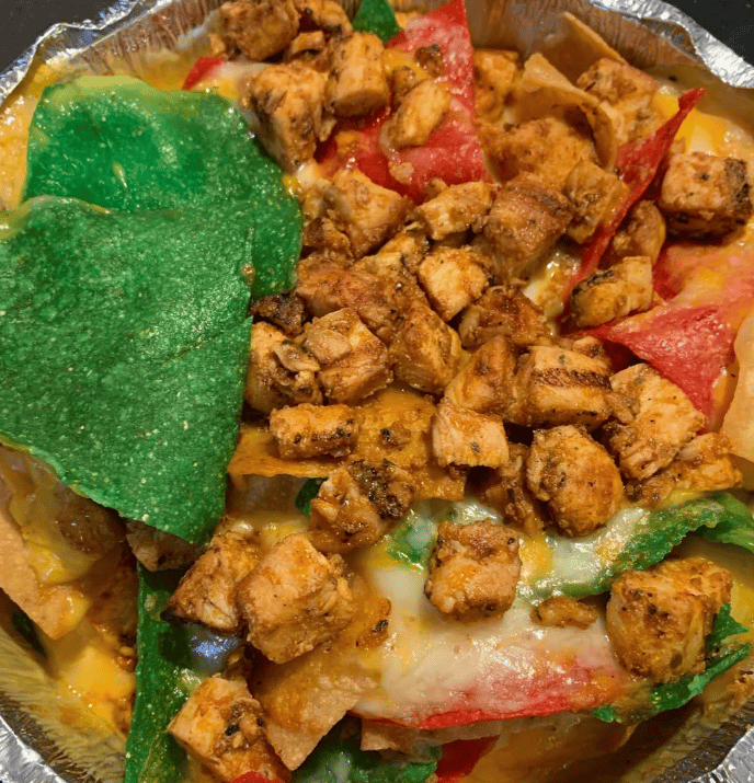 Authentic cheesy enchiladas topped with signature sauce